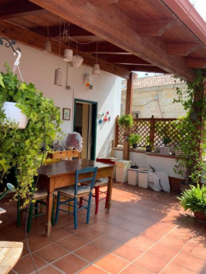 Camere con bagno privato in appartamento condiviso con host